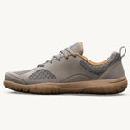 Slate gray lightweight sneaker with tan cushioned sole and breathable mesh panels.