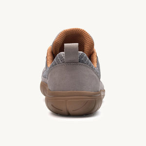 Slate gray Lems Primal 3 sneaker with brown gum sole, knit fabric upper, and padded collar viewed from the back.