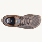 Slate gray athletic shoe with mesh upper, padded collar, and tan accents from Lems Primal 3 series.