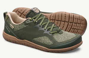 Green and beige low-top athletic shoe with gum sole and lace-up design.