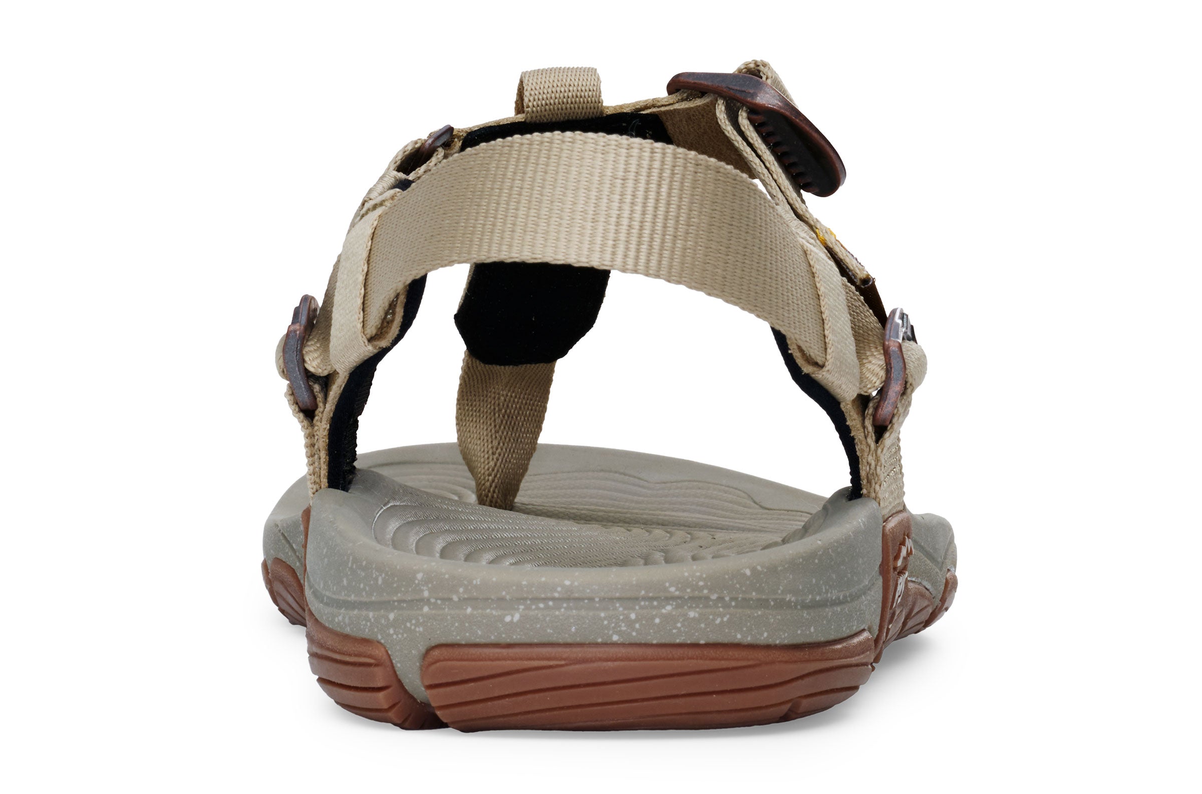 Tan and gray casual sandals with adjustable straps and brown textured soles, rear view.