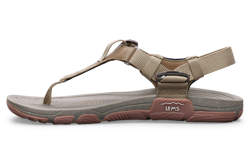 Tan and brown Lems Switchback sandal with adjustable straps and cushioned sole.