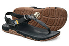Black leather toe-loop sandals with adjustable straps and textured brown rubber soles.