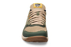Green and beige Lems Trail Blazer Juniper casual sneaker with tan laces and gum sole, front view.
