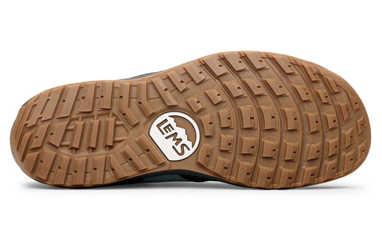 Brown rubber outsole with textured tread and white Lems logo embossed in the center.