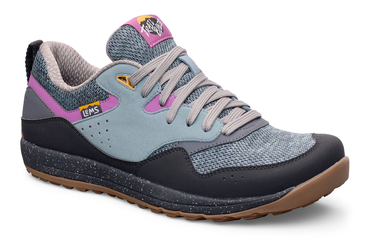 Lems Trail Blazer casual sneaker in thunder color with grey mesh upper, black suede accents, pink detailing, and gum sole.