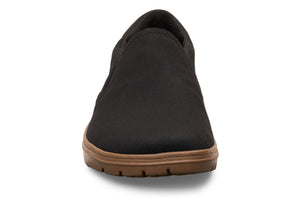 Black slip-on casual shoe with smooth fabric upper and tan rubber sole.