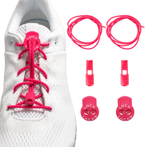 Hot pink Lock Laces no-tie shoelaces on white sneaker with locking clips and round lace ends.