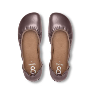 Bronze wide-fit ballet flats with rounded toe and soft ruched trim, cushioned insole visible.