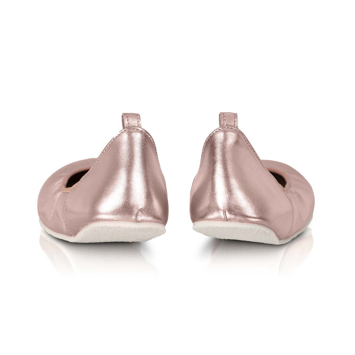 Rose gold wide barefoot ballerina flats with a smooth finish and a small heel tab, view from the back.