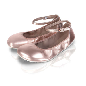 Rose gold barefoot ballerina flats with ankle straps and small buckle closures.