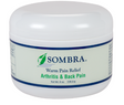 White jar of Sombra Warm Therapy cream for arthritis and back pain, 8oz, with green and blue label.