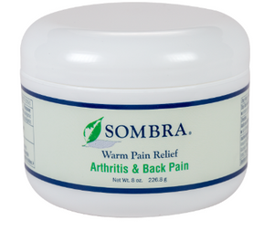 White jar of Sombra Warm Therapy cream for arthritis and back pain, 8oz, with green and blue label.