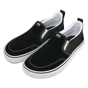 Black slip-on sneakers with white soles on a white background