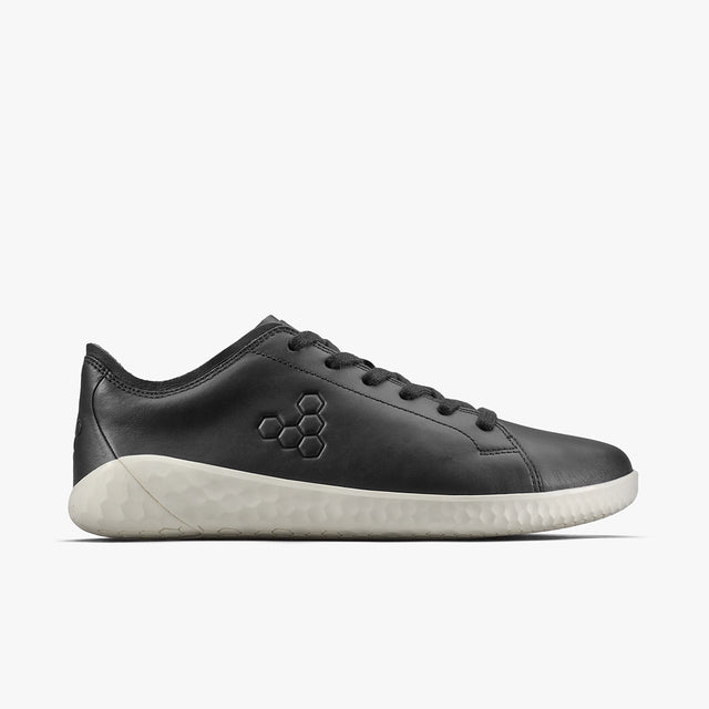 Men's black leather low-top sneaker with white textured sole and minimalist logo on side.