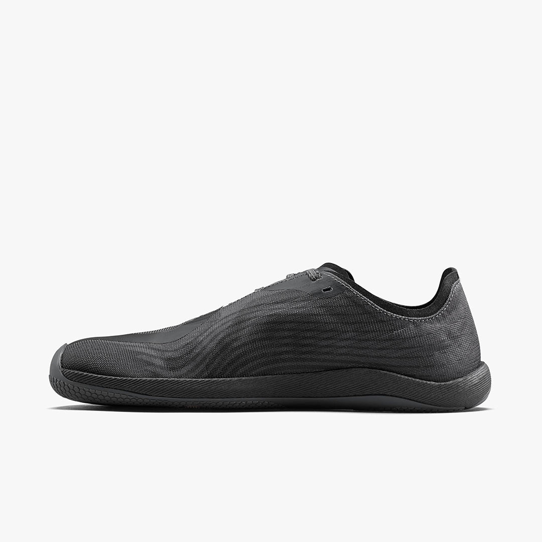 Dark shadow Vivobarefoot men's Primus Flow minimalist sneaker with textured upper and low-profile sole.