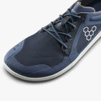 Midnight blue lightweight mesh athletic shoe with minimalist sole and honeycomb logo on side.