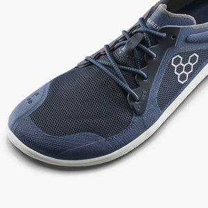 Midnight blue lightweight mesh athletic shoe with minimalist sole and honeycomb logo on side.