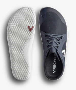 Navy Vivobarefoot Primus Lite III sneaker with textile upper and honeycomb-patterned white sole.
