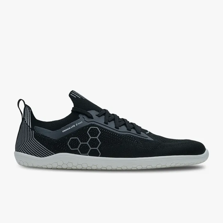 Black knitted minimalist sneaker with hexagonal side pattern and white sole.