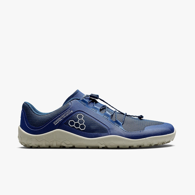 Insignia blue athletic shoe with lace toggle, breathable mesh upper, and textured white sole.