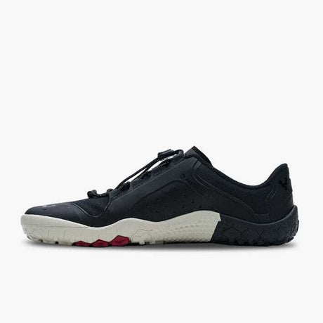 Black low-profile athletic shoe with white sole and red tread accents, sleek breathable design.