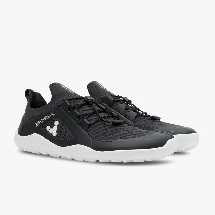 Black lightweight knit athletic shoes with white sole and pull tabs, featuring Vivobarefoot logo on side.