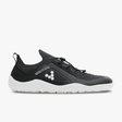 Black knit athletic shoe with white sole, slip-on design, and adjustable bungee laces.