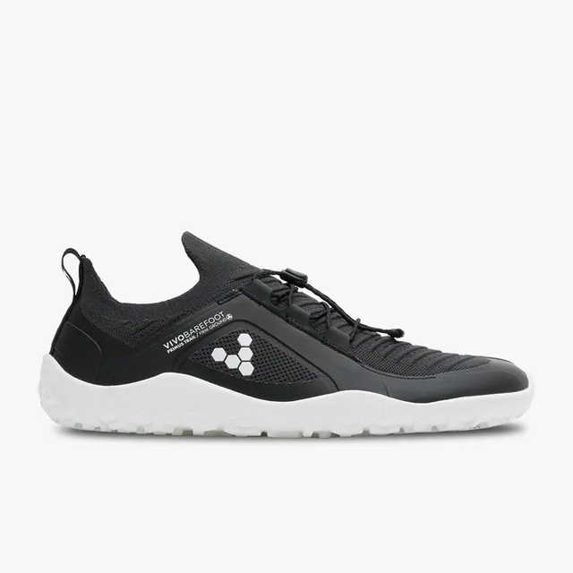 Black knit athletic shoe with white sole, slip-on design, and adjustable bungee laces.