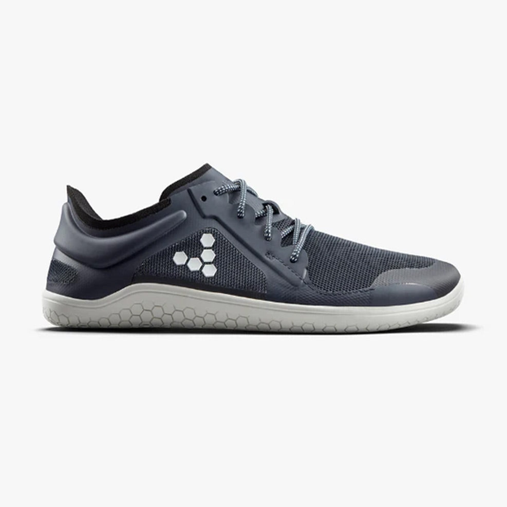 Navy navy textile athletic shoe with white hexagonal logo and textured white sole.