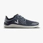 Navy navy textile athletic shoe with white hexagonal logo and textured white sole.