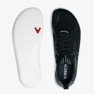 Black knitted Vivobarefoot Primus Lite sneaker with white sole and minimalist design.