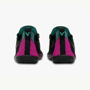 Vivobarefoot women's athletic shoes with black knit upper and vibrant pink vertical stripes on heel.