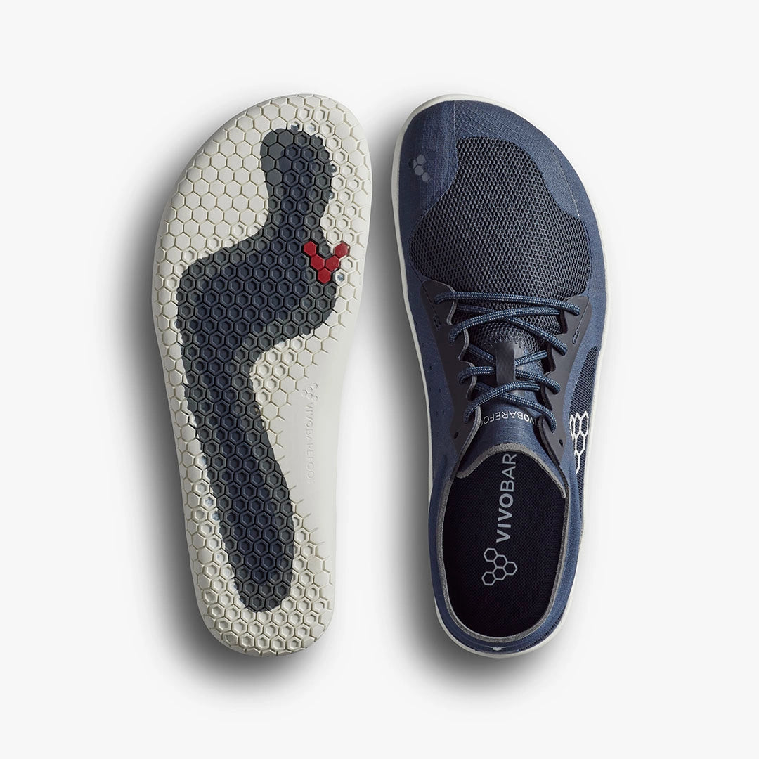 Insignia blue Vivobarefoot Primus Trail FG 3.5 with textured sole and lace-up design.