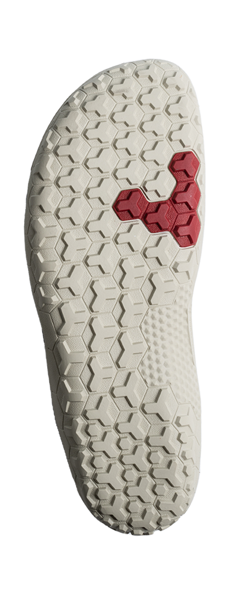 Off-white textured sole with hexagonal tread pattern and red hexagon insert near the center.