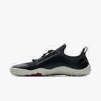 Black and gray low-profile athletic shoe with knit upper and textured white sole.