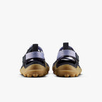 Pair of purple heather Vivobarefoot women's Tracker sandals with black straps and rugged tan soles shown from the back.