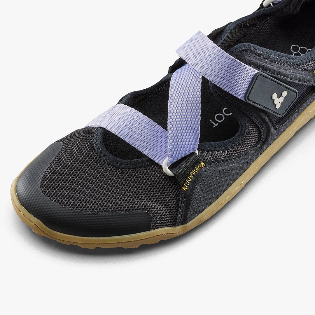 Black mesh athletic sandal with purple adjustable straps and gum rubber sole.