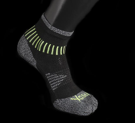 Black and grey quarter crew sock with neon green accents and textured heel and toe areas.