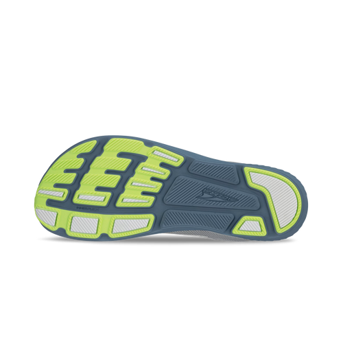 Gray and lime running shoe sole with textured tread and flex grooves.