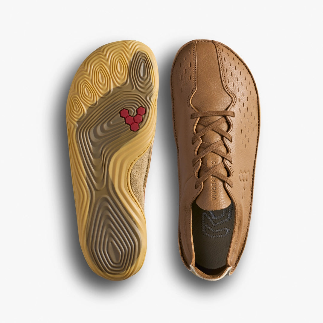 Tan shoe with a red logo on the sole, displayed on a light gray background.